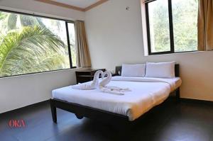Postelja oz. postelje v sobi nastanitve Ora Classic " Budget Stay Near to Calangute Beach " Free WiFi