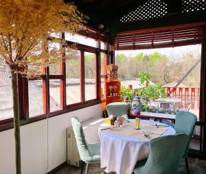 Restaurace v ubytování Jingshan Garden Hotel