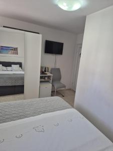 Posteľ alebo postele v izbe v ubytovaní Room near the center + 7 fotografií