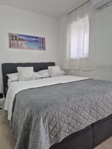 Posteľ alebo postele v izbe v ubytovaní Room near the center