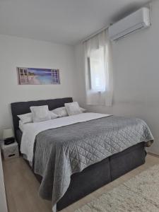 Posteľ alebo postele v izbe v ubytovaní Room near the center