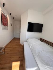 Postel nebo postele na pokoji v ubytování Boutique Hotel am Rathaus - Reblaus