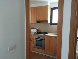 Dapur atau dapur kecil di Macenas apartamento perfecto para familias