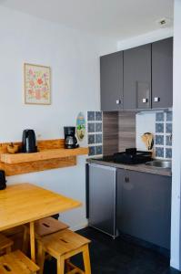 Køkken eller tekøkken på à quelques pas de la plage