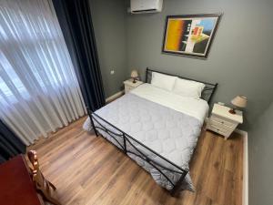 Postel nebo postele na pokoji v ubytování HOTEL VILA 15 - CENTER