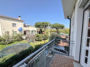 a balcony with a view of a yard at VILLA FELICE in Loano