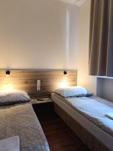 Posteľ alebo postele v izbe v ubytovaní Noclegi "Poza Szlakiem"