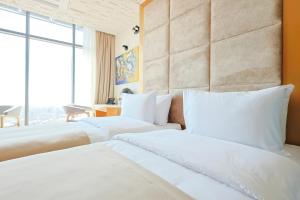 Voodi või voodid majutusasutuse Carat Hotel Yerevan toas