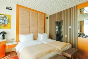 Voodi või voodid majutusasutuse Carat Hotel Yerevan toas