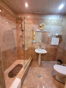 Koupelna v ubytování David Hotel - Ethno style
