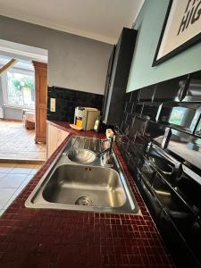 Kuchyň nebo kuchyňský kout v ubytování Apartment nähe Offenburg EuropaPark