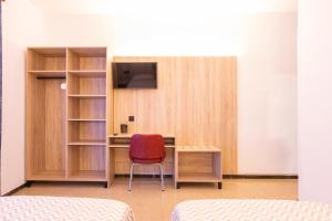 TV a/nebo společenská místnost v ubytování Hotel Bell Aire
