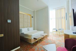 Voodi või voodid majutusasutuse Carat Hotel Yerevan toas