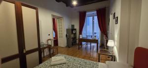 A bed or beds in a room at Appartamento Casa Toledo