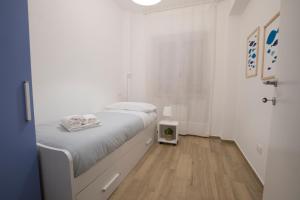 Postel nebo postele na pokoji v ubytování Kalos apartments