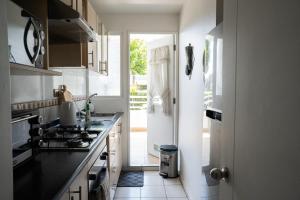 Kuchyň nebo kuchyňský kout v ubytování Viña Center Apartment Rodoviario Quinta Vergara