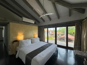 Temple Tree Retreat客房内的一张或多张床位