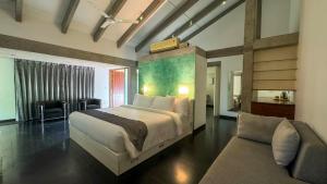 Temple Tree Retreat客房内的一张或多张床位