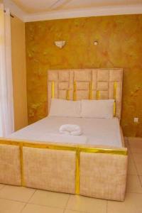 Postel nebo postele na pokoji v ubytování Dee's Beach View Apartment