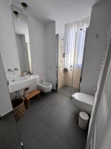 Koupelna v ubytování Talè Restaurant & Suite