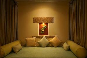 Postel nebo postele na pokoji v ubytování Sanctuary Amaidiyana - A CGH Earth Experience