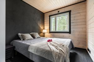 Postel nebo postele na pokoji v ubytování Villa Onni by Hilla Villas