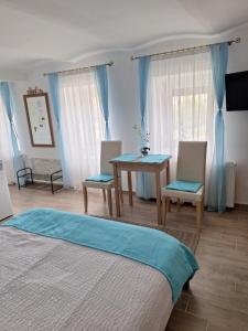 Postel nebo postele na pokoji v ubytování Várfal apartman