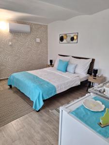 Posteľ alebo postele v izbe v ubytovaní Várfal apartman