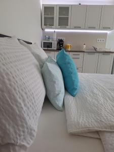 Posteľ alebo postele v izbe v ubytovaní Várfal apartman