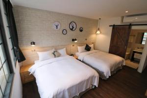 Postel nebo postele na pokoji v ubytování Pinestone Inn