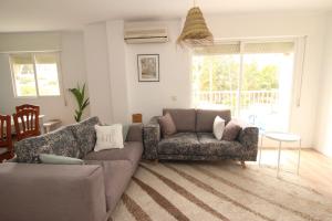 Khu vực ghế ngồi tại Duplex alteano los Jardines del Casco Antiguo