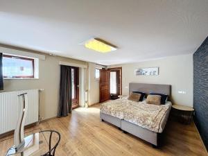 Postel nebo postele na pokoji v ubytování La Suite des Forges