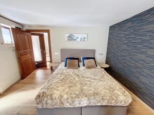 Postel nebo postele na pokoji v ubytování La Suite des Forges