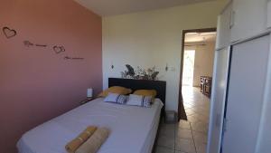 Ένα ή περισσότερα κρεβάτια σε δωμάτιο στο Villa Cap Jaune, Piscine, Détente, Vue à Vincendo