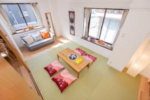 an overhead view of a living room with a table at Akabanestay A 志茂 in Tokyo