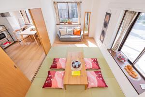 a view of a living room with a table at Akabanestay A 志茂 in Tokyo