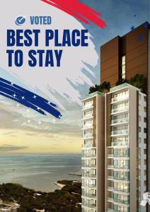 Sea View High Flr,2 Bed Room Exclusive At Pattaya في جنوب باتايا: ملصق لمبنى يحمل الكلمات التي تم التصويت عليها كأفضل مكان للإقامة +39 صورة