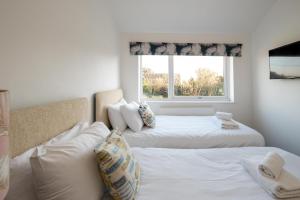 Postel nebo postele na pokoji v ubytování 51 The Plantation - Aldeburgh Coastal Cottages