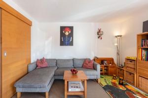 a living room with a couch and a table at Ferienwohnung Bergahorn in Todtnauberg