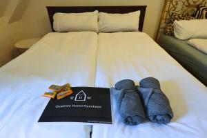 Quadrate Hostel Mannheim Z6 Denkmalschutz客房内的一张或多张床位