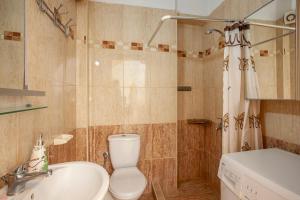 Et badeværelse på Alex apartment