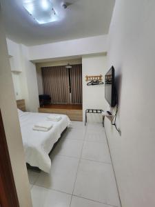 Postel nebo postele na pokoji v ubytování 馥芯莟旅棧