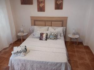 Postel nebo postele na pokoji v ubytování habitacion compartida con anfitrión