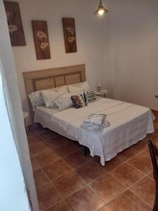Postel nebo postele na pokoji v ubytování habitacion compartida con anfitrión