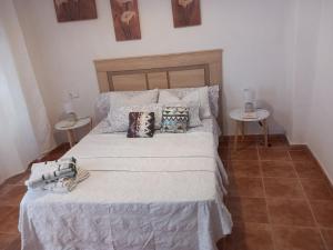 Postel nebo postele na pokoji v ubytování habitacion compartida con anfitrión