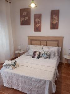 Postel nebo postele na pokoji v ubytování habitacion compartida con anfitrión