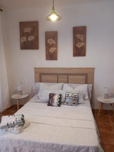 Postel nebo postele na pokoji v ubytování habitacion compartida con anfitrión