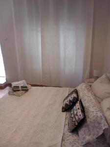 Postel nebo postele na pokoji v ubytování habitacion compartida con anfitrión