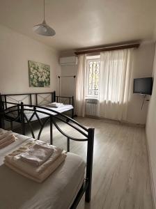 Postel nebo postele na pokoji v ubytování Apartment in the center of Erevan