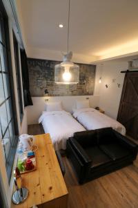 Postel nebo postele na pokoji v ubytování Pinestone Inn
